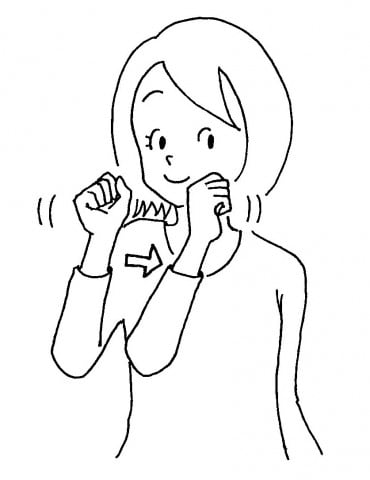 手遊び顔の前でグー